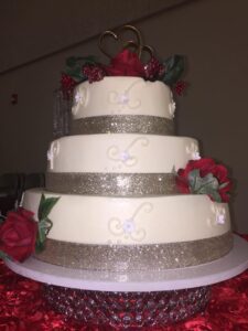 three their wedding cake with silver glitter detail